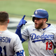 Max Muncy and the Dodgers exploded for 11 runs in the first inning of Wednesday’s 15-3 win over Atlanta.